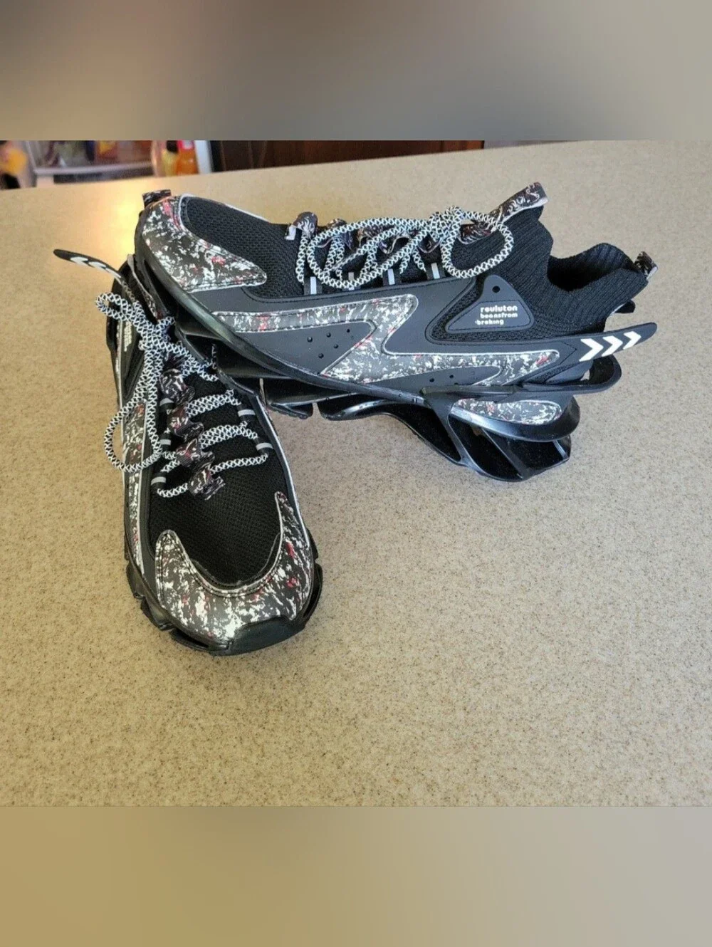 Reuluton Beansfrom Breking Blades Futuristic Looking Sneakers Black Grafiti